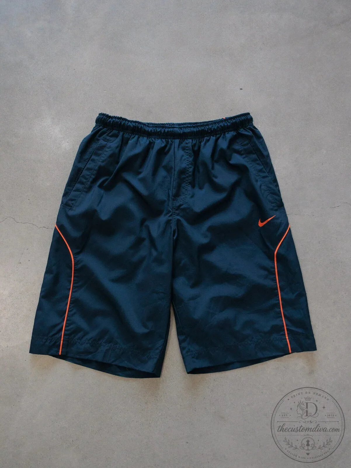Vintage Nike Navy Blue Swim Shorts with Orange Trim